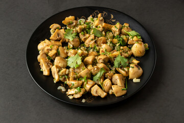 Garlic Mushroom fry served in dish isolated on background top view of bangladesh and indian food