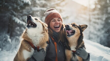 A young woman in warm clothes walking her 2 dogs in a picturesque snowy mountain outdoor. Female laughing and playing with pets and one dog licking an owner's cheek.Human and pets winter concept image - Powered by Adobe