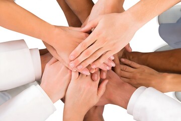 Directly Above Shot Of Medical Team Standing Hands