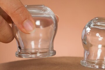 Person Giving Cupping Treatment