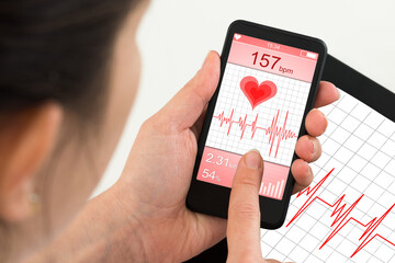 Doctor Looking At App For Health