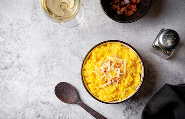 Pumpkin risotto with fried bacon