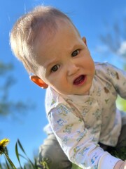 child with dandelion