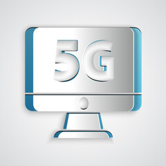 Paper cut Monitor with 5G new wireless internet wifi icon isolated on grey background. Global network high speed connection data rate technology. Paper art style. Vector