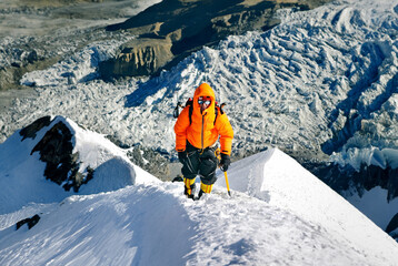 A climber during the ascent to the summit of Mount Everest - 639694953