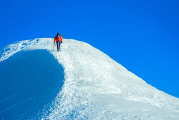 A climber reaches the summit of Everest in Nepal - 639695509