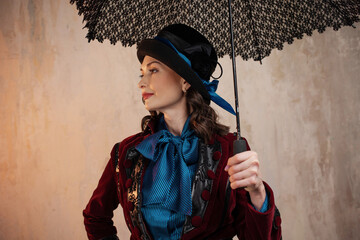 Mary Poppins. A stylish lady in a burgundy old - fashioned suit with a hat and a lace umbrella ....