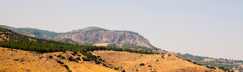Fototapeta na wymiar Turkish mountains and green forest panorama