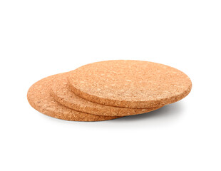 Round cork table coasters on white background