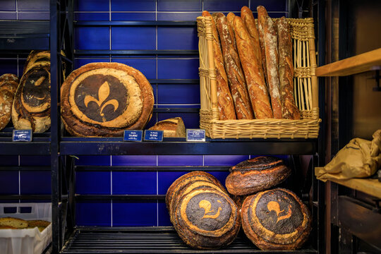 Freshly baked rustic French levain sourdough bread at a bakery in Menton, France