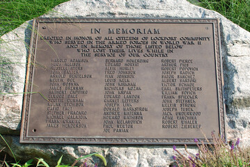 AUGUST 18, 2023. LOCKPORT, ILLINOIS, USA. A plaque honoring Lockport citizens who served in the military during World War II. It is in front of City Hall, also called the Central Square building.