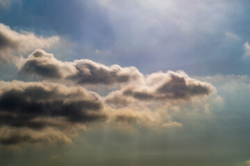 Obraz premium Amazing pictures of variety of clouds at different moments, lighting, time of day. To create atmospheric collages, like background, screensaver, desktop wallpaper, add various inscriptions, postcards