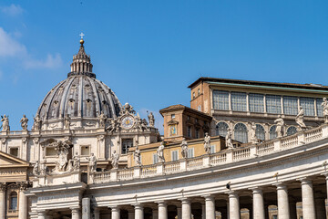 St. Peter's Basilica and Apostolic Palace from Saint Peter's Square in Vatican City on a clear summers day 