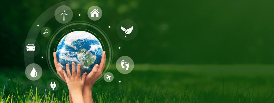 Earth care concept with hands holding globe. Elements of this image furnished by NASA.