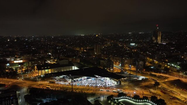 night illuminated barcelona city market traffic street square aerial panorama 4k spain