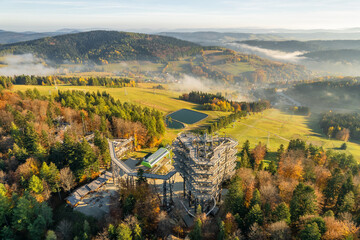 Tree top observation tower in resort town Krynica-Zdroj at sunrise, Poland - 639714191
