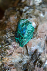 Malachite mineral stone on stone background