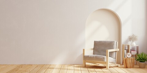 Scandinavian living room with grey armchair on empty white wall background.