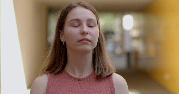 Portrait of a young girl who cannot decide what she wants. Anxiety and uncertainty about the future. Student in search of herself. 