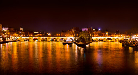 River Seine and Pont Neuf bridge at Night, Parius, France