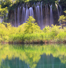 Waterfalls panorama in Plitvice Lakes National Park, Croatia, Europe. Majestic view with turquoise water and nice reflections