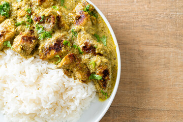 Afghani chicken in green curry or Hariyali tikka chicken hara masala with rice