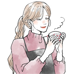 ホットドリンクを飲んでリラックスする女性