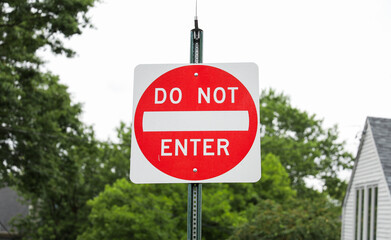 Do Not Enter sign signifies restricted access, a barrier against unwanted paths, emphasizing...