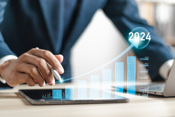 Businessman analyzing financial data for long-term investment in 2024. Financial and investment business planning and development.