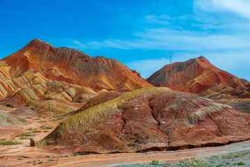 Crédence de cuisine en verre imprimé Zhangye Danxia Aerial view of Colorful mountains of the Zhangye Danxia Geopark, China against the blue sky, different colors of the rock formations, background image