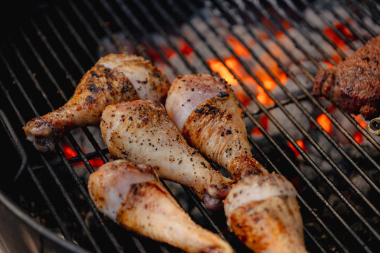 Chicken drumsticks on a charcoal bbq