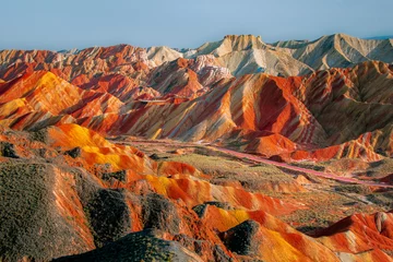 Foto op Plexiglas Zhangye Danxia Aerial view of Colorful mountains of the Zhangye Danxia Geopark, China, different colors of the rock formations, background image, sunset view