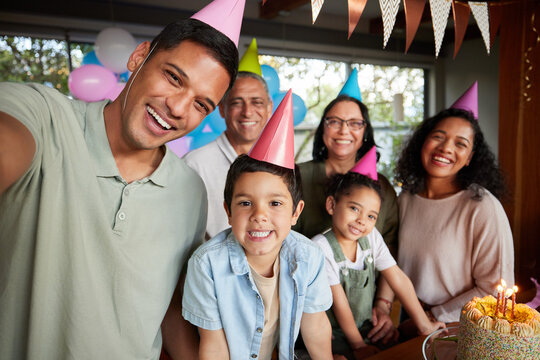 Family selfie, birthday party and cake with kids, celebration and support with smile, hat and portrait in home. Children, memory and profile picture with love, food and dessert with social media post