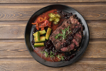 Grilled meat steak on a plate, restaurant menu