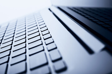 Close up image of laptop keyboard on isolated background.