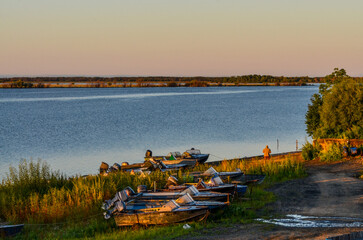 boats at Amur river harbor in Verkhnii Nergen (Nanaysky district, Khabarovsk krai, Russia)