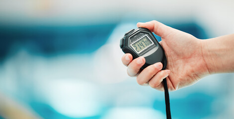 Hand, stopwatch and mockup with a fitness coach closeup in a sports center for time or training....