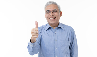 Fototapeta premium Middle age man doing positive gesture with thumbs up smiling to the camera