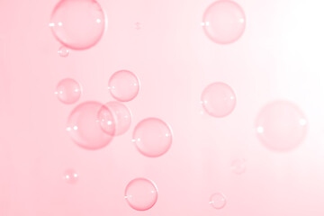 Refreshing of Soap suds, Bubbles Water. Beautiful Transparent Pink Soap Bubbles Floating in The Air. Abstract Background, Pink Textured, Celebration Festive Romance Backdrop.