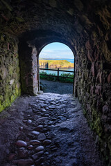 Inner passageway that will lead to a cliff overlooking the beach in Dunnottar Castle, Scotland.