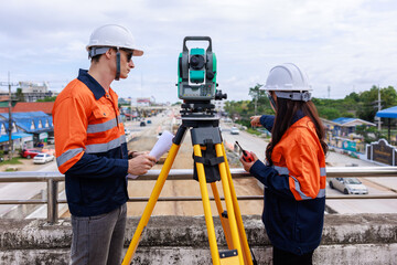 Civil officers with new road contruction site surveys,