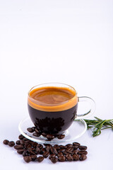 Coffee cup and coffee beans on white background.