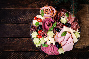 Colorful charcuterie boards and boxes vegetables, meat and cheese.  Assortment of tasty appetizers or antipasti. Top view. Copy space