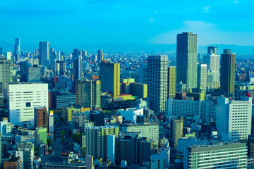 Fototapeta na wymiar A dusk cityscape by high angle view near the office buildings in Osaka 