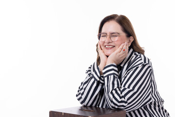 Portrait of confident mature woman wearing formalwear against white background