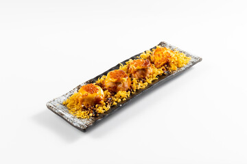 sushi with chopsticks close up. Assorted japanese sushi food. sushi with tuna, crab, salmon, eel and rolls. Japanese food isolated on white background