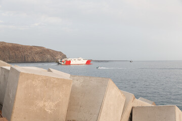 Setting Sail: Passenger Ferry Embarking from Port