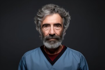 Obraz premium Portrait of senior male nurse and doctor looking at camera in studio. Photo generative AI