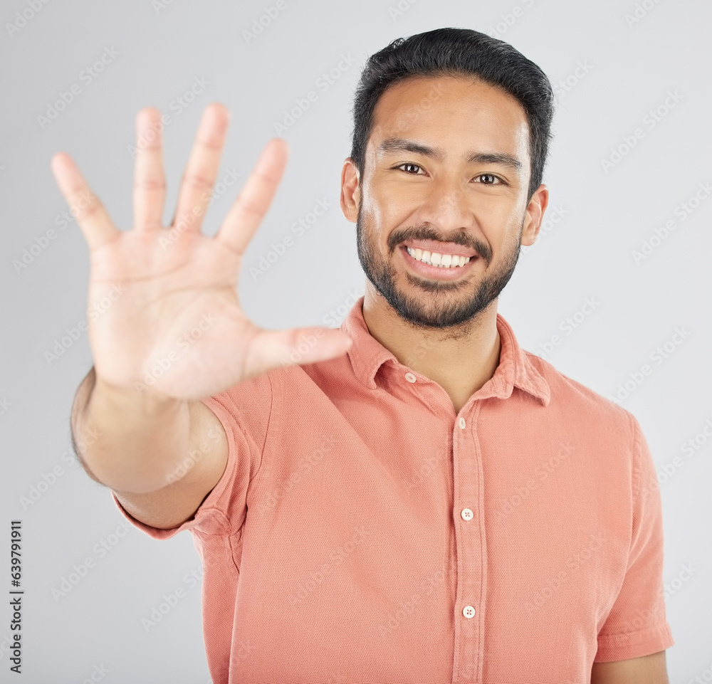 Poster smile, hand and portrait of man with stop gesture happy for communication isolated in a studio white