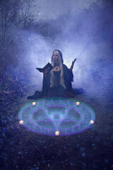 a blonde witch with long hair in a black hoodie is conjuring a spell with a pentagram and candles on the street